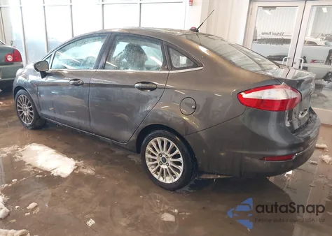 2015 Ford Fiesta Titanium from USA, damaged, VIN 3FADP4CJ2FM129362